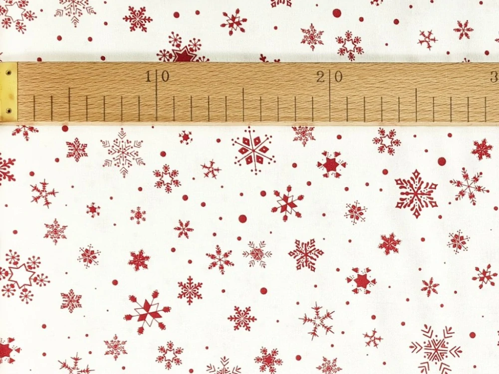Bavlněné plátno - Vločky tm. červené na krémově bílé
