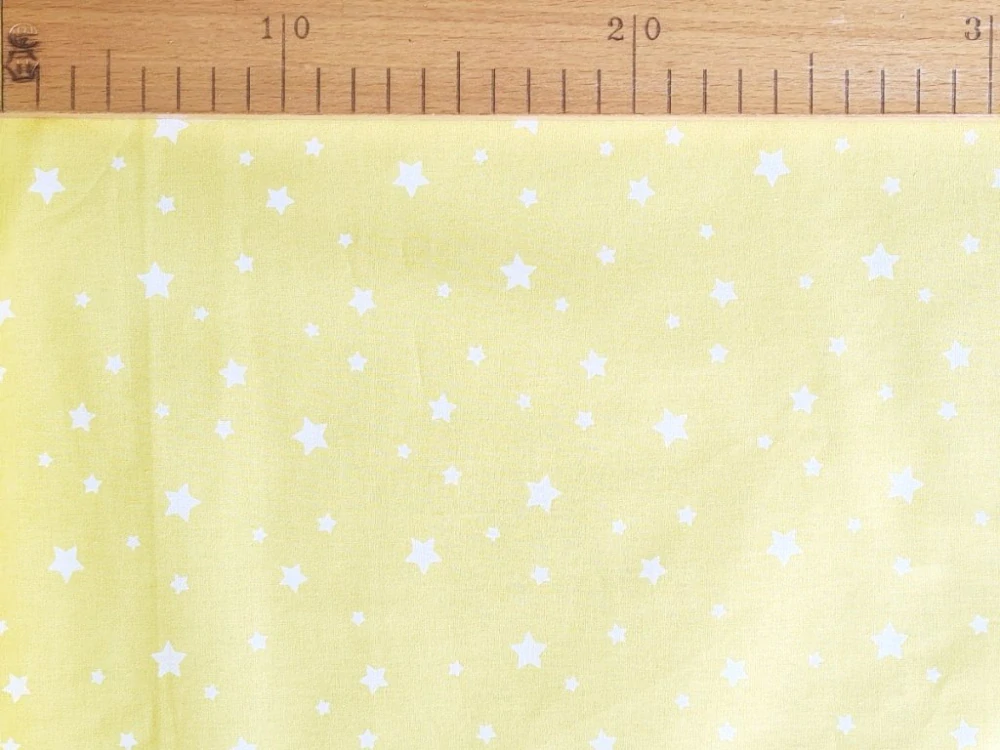 Bavlněné plátno - Hvězdičky na pastelově žluté