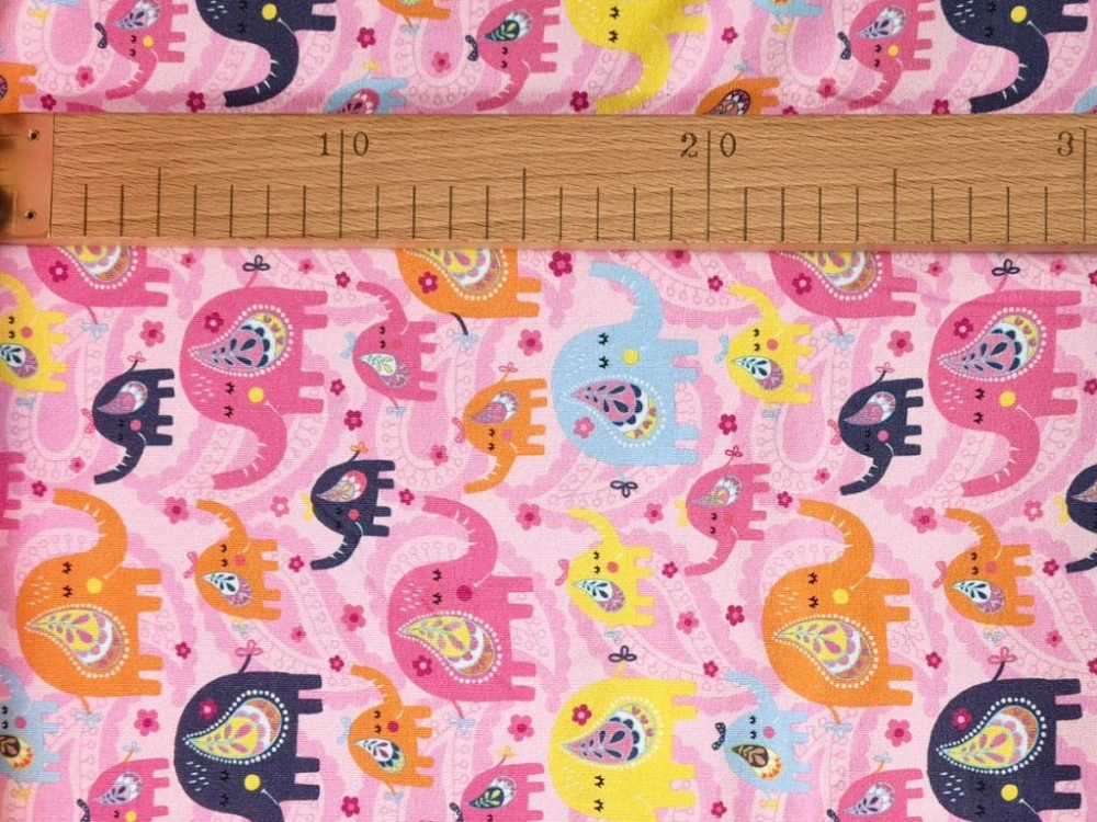 Jednolícní elastický úplet - Sloni na růžové